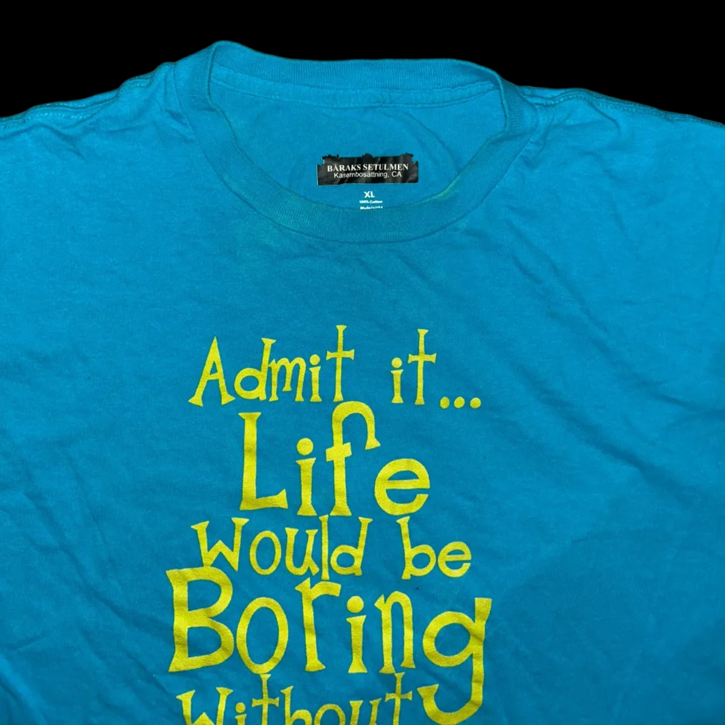Blue t-shirt with yellow text